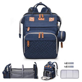 All-in-One Diaper Backpack with Built-in Changing Station & Bassinet